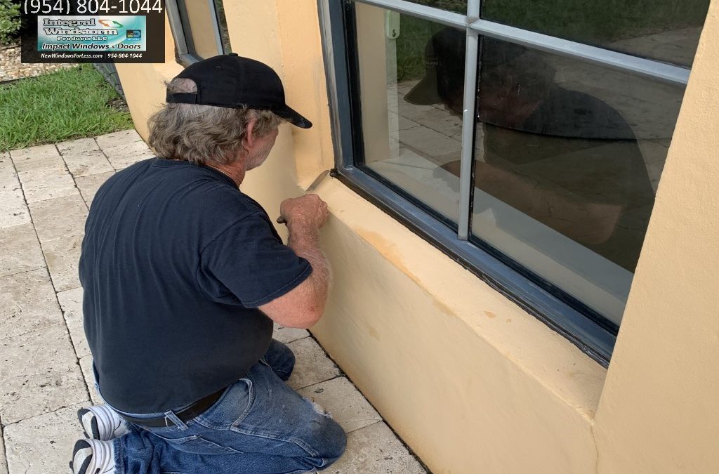 Window frame caulking and leak repair